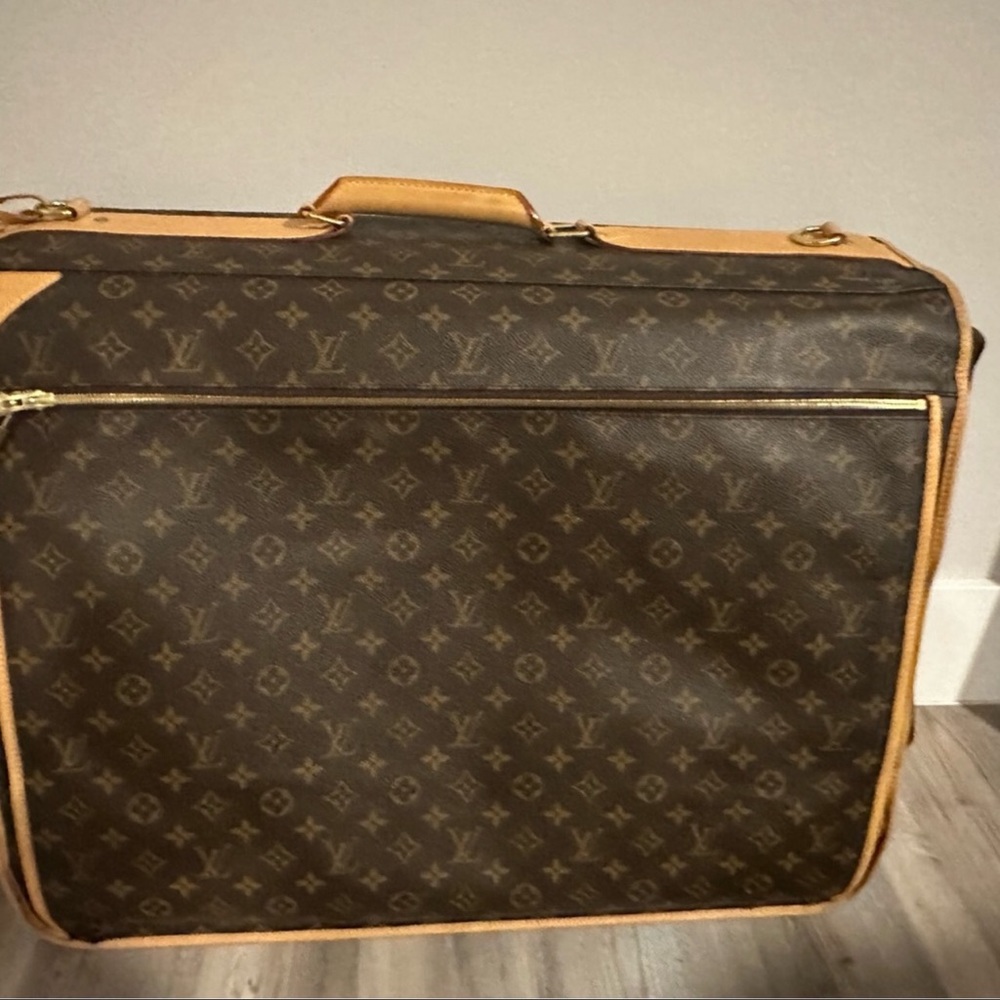 Louis Vuitton classic LV Monogram Hanging Folding Garment Bag. Travel in style!